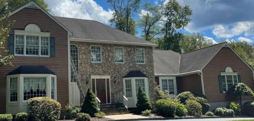 House exterior in Morristown NJ during ideal weather conditions for exterior painting